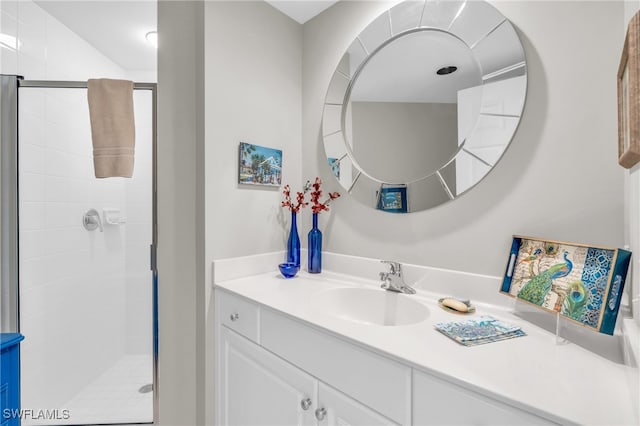 bathroom with vanity and walk in shower