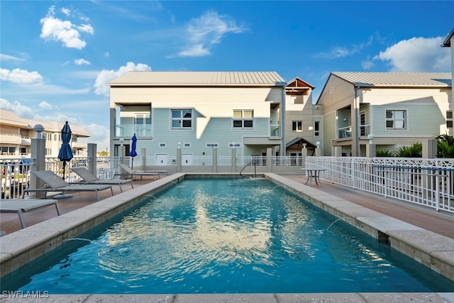 view of pool featuring pool water feature