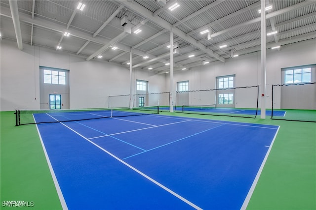 view of sport court with basketball hoop