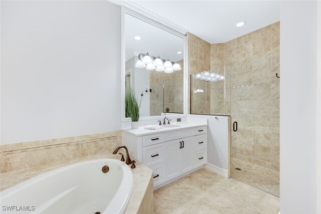 bathroom with tile patterned floors, vanity, and separate shower and tub