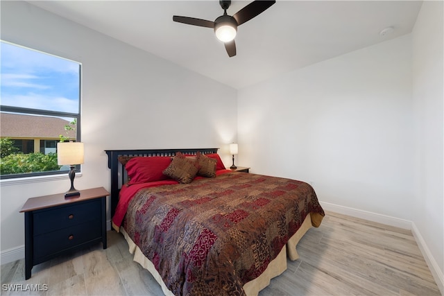 bedroom featuring ceiling fan and light hardwood / wood-style flooring