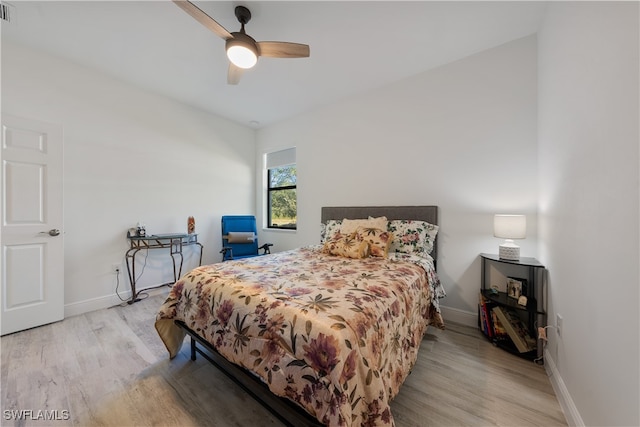 bedroom featuring light wood-type flooring and ceiling fan