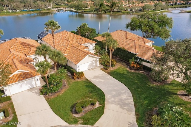 birds eye view of property featuring a water view