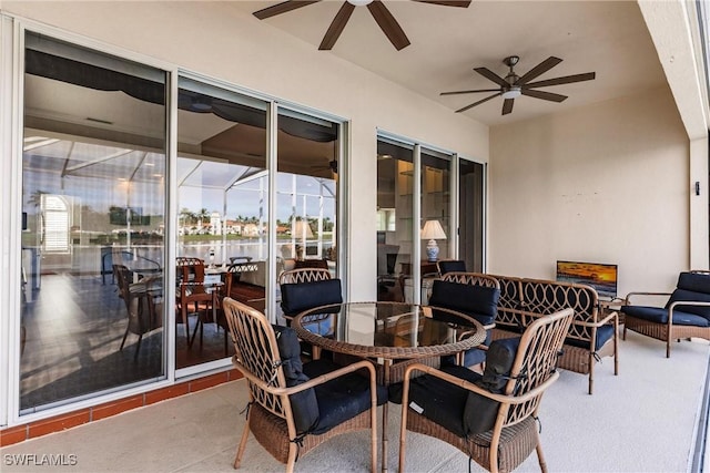 view of patio / terrace featuring ceiling fan and an outdoor living space