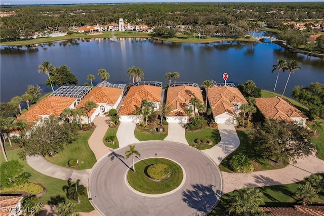 bird's eye view with a water view