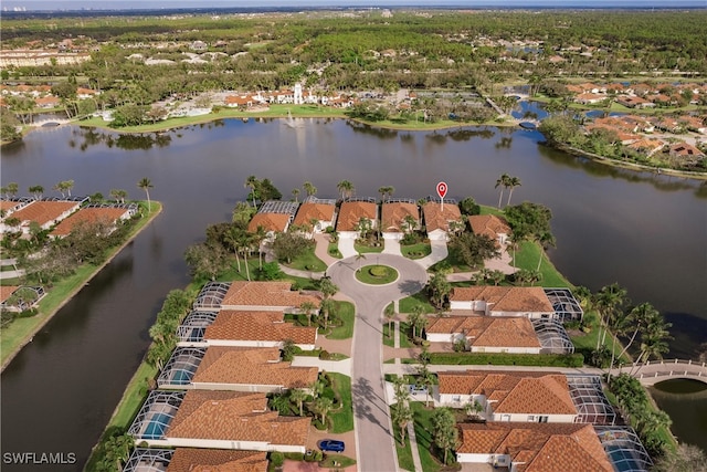 birds eye view of property featuring a water view