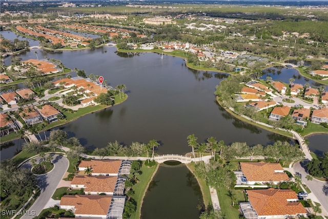 bird's eye view with a water view