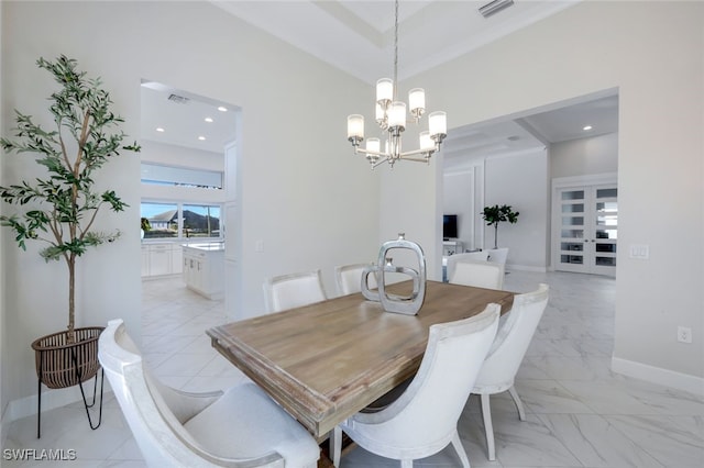 dining room featuring a notable chandelier