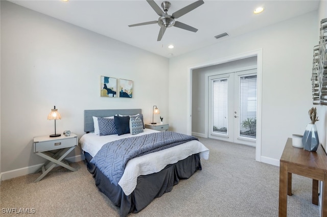 carpeted bedroom with access to exterior, french doors, and ceiling fan