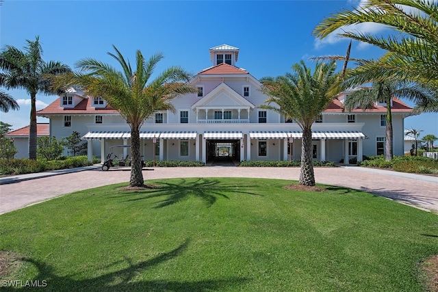 view of front of property with a front lawn