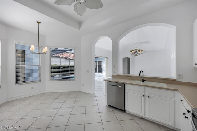 kitchen featuring dishwasher, white cabinets, hanging light fixtures, and sink