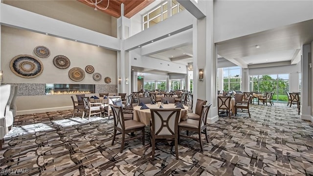 dining area with a high ceiling