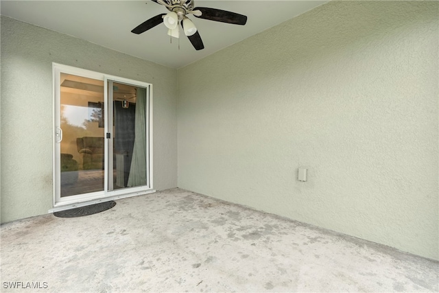 view of patio / terrace featuring ceiling fan