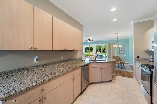 kitchen with a peninsula, a sink, appliances with stainless steel finishes, light brown cabinetry, and crown molding