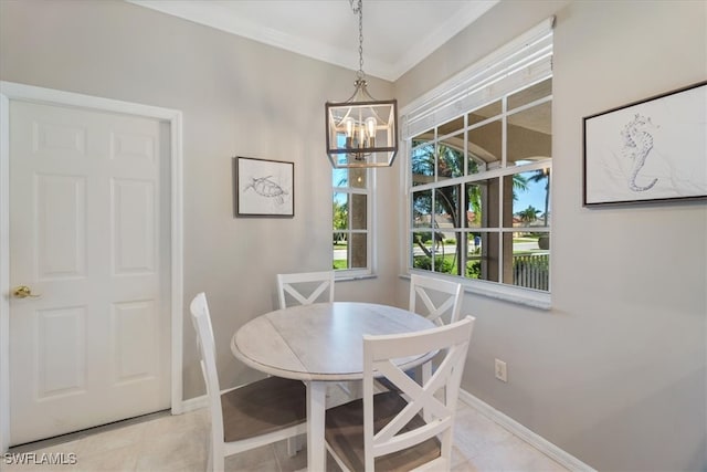 tiled dining area with ornamental molding and an inviting chandelier