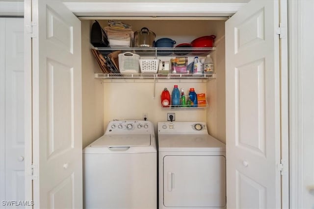 laundry area featuring laundry area and washer and dryer