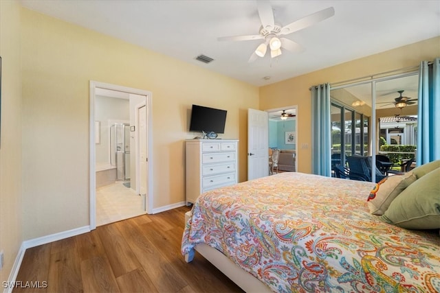 bedroom featuring ceiling fan, access to exterior, wood-type flooring, and connected bathroom