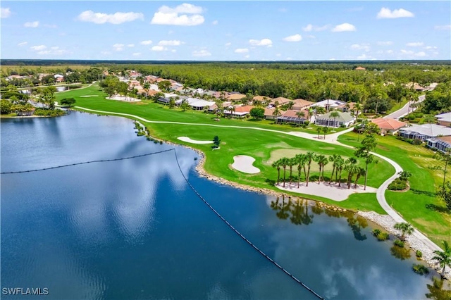 birds eye view of property featuring a water view and view of golf course