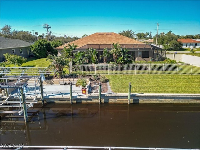 dock area with glass enclosure and a yard