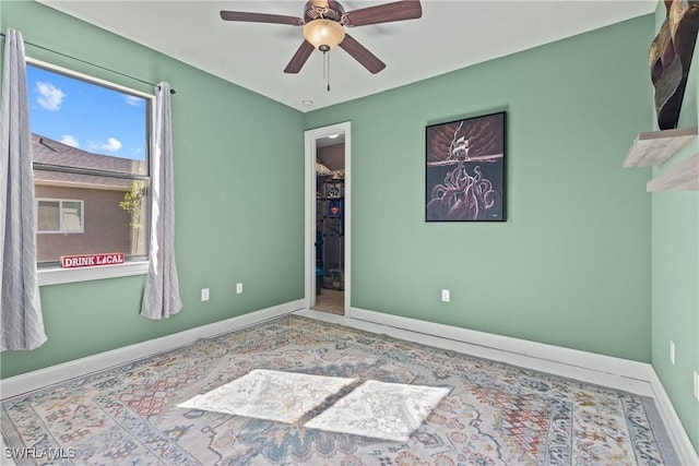 empty room with ceiling fan