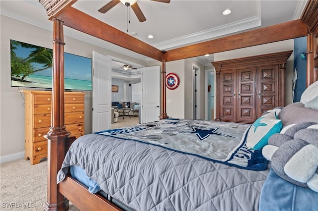 carpeted bedroom with ceiling fan and crown molding