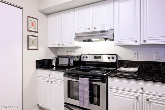 kitchen featuring stainless steel range with electric stovetop, white cabinets, and dark stone countertops