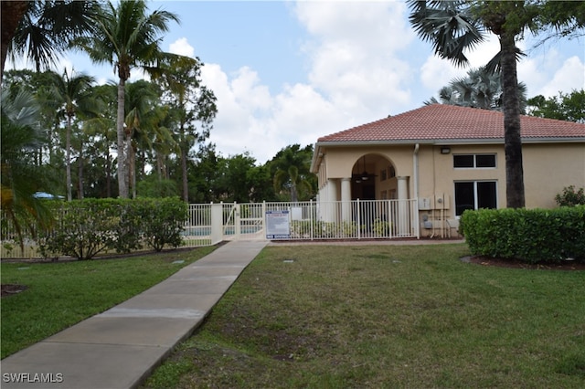 exterior space with a front yard