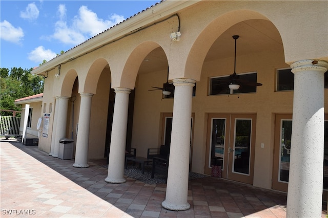 view of patio with french doors and ceiling fan