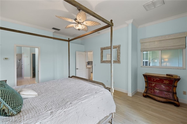 bedroom with light wood-type flooring, ceiling fan, and crown molding