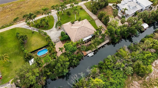 drone / aerial view with a water view