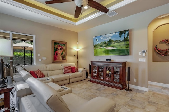 living room featuring ceiling fan and crown molding