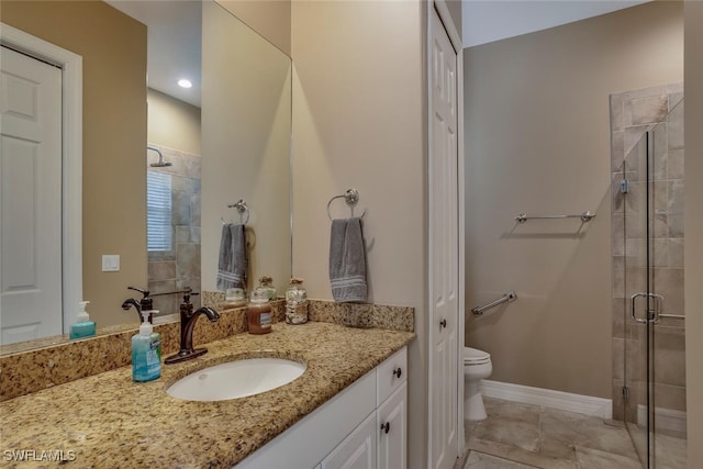 bathroom with walk in shower, tile patterned flooring, vanity, and toilet