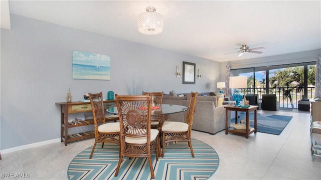 dining space featuring ceiling fan