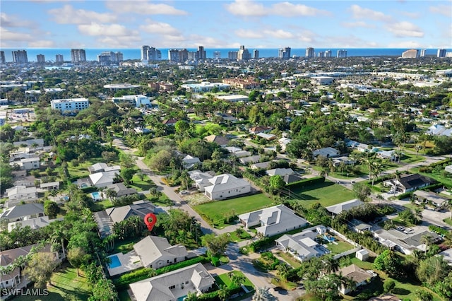 drone / aerial view with a water view