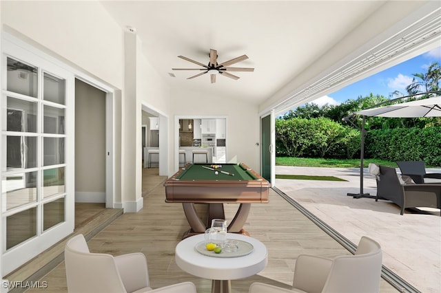 rec room with light wood-type flooring, ceiling fan, lofted ceiling, and billiards