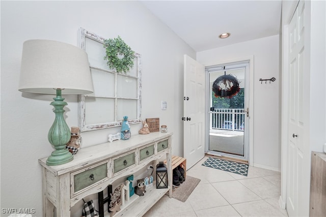 1140 Sarah Jean Cir Unit C-205, Naples, FL 34110 - entryway featuring light tile patterned flooring and recessed lighting