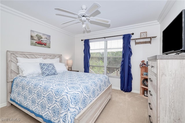 bedroom featuring light colored carpet, ornamental molding, and ceiling fan