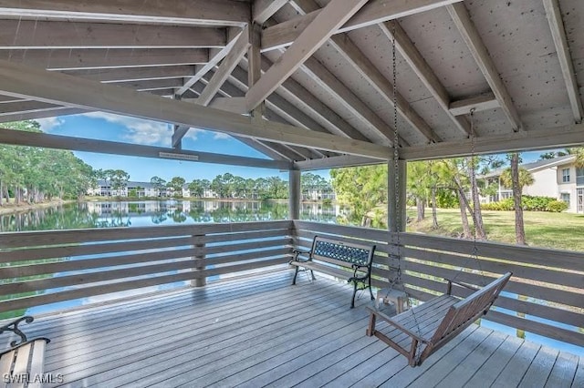 deck featuring a water view