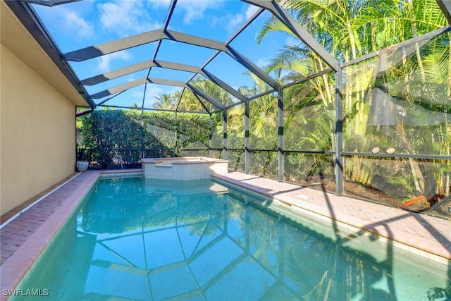 view of pool with a lanai