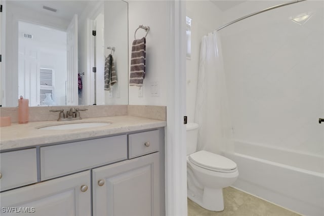 full bathroom with tile patterned flooring, vanity, shower / bath combination with curtain, and toilet