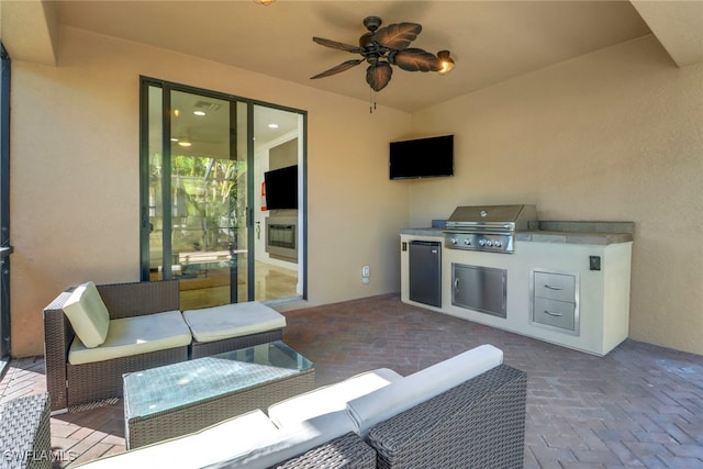 view of patio / terrace with a grill, area for grilling, and an outdoor hangout area