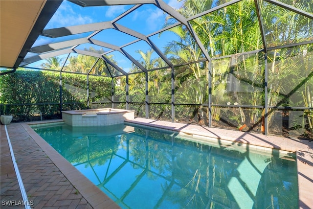 view of pool with glass enclosure