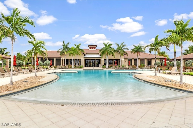 view of swimming pool with a patio area