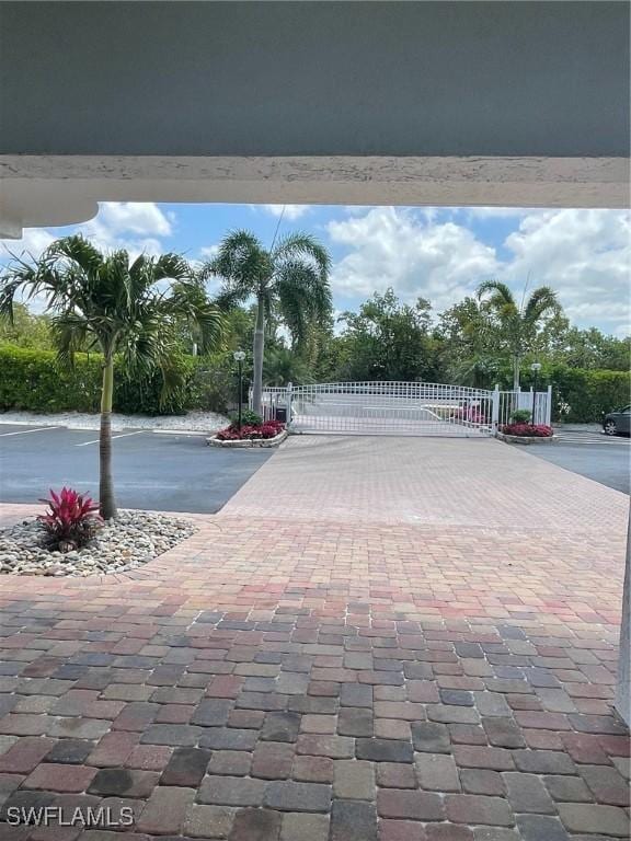 view of property's community with a gate