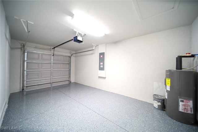 garage with a garage door opener, electric water heater, and electric panel