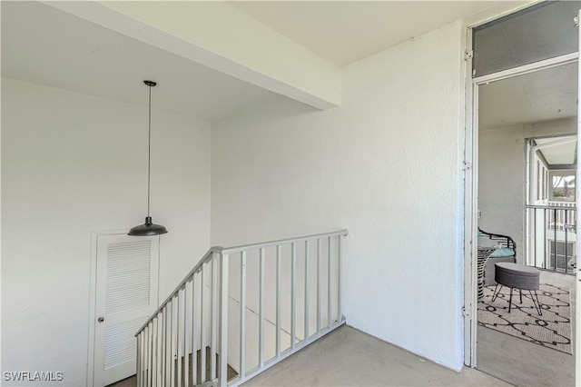 corridor featuring concrete floors