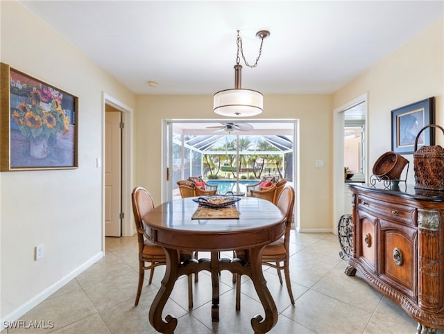 dining room featuring ceiling fan and light tile patterned floors