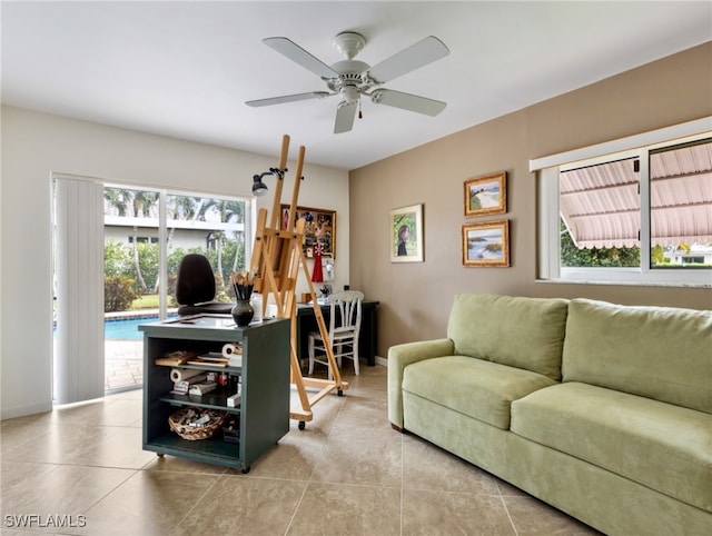 tiled office space featuring ceiling fan and a wealth of natural light