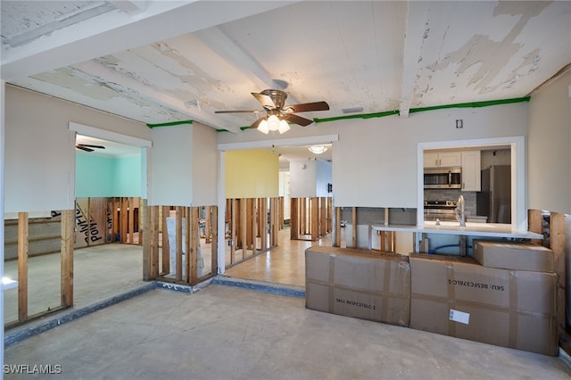 living room featuring ceiling fan