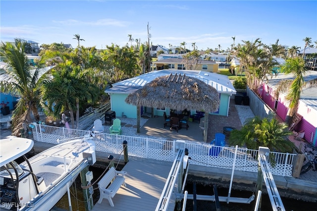 back of property with a wooden deck